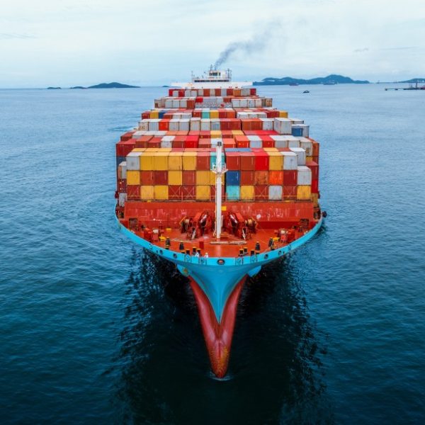 aerial-in-front-of-cargo-ship-carrying-container-a-2022-03-04-12-19-14-utc